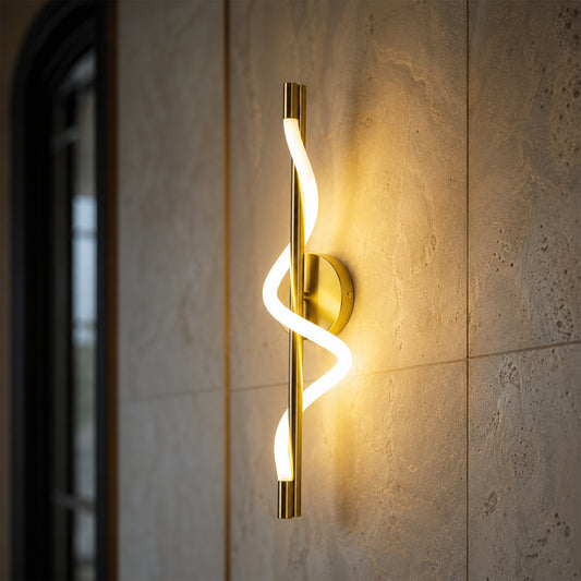 Modern gold metal LED wall light lifestyle image with artistic glowing design for elegant luxury interior decor.