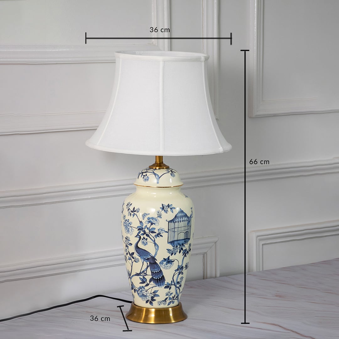 Classic table lamp with ceramic base and white fabric shade showing height 66 CM and shade width dimensions for interior placement reference.