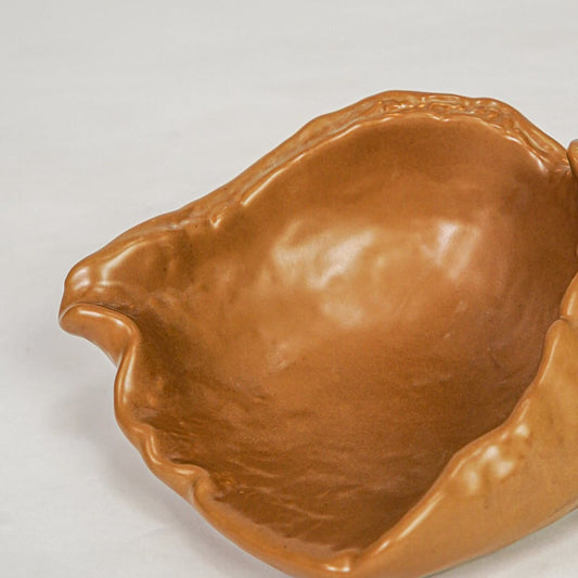 Brown ceramic decorative bowl with glossy finish modern centerpiece bowl for table console shelf home decor styling.