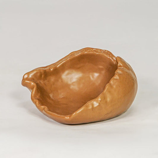 Brown ceramic decorative bowl with glossy finish modern centerpiece bowl for table console shelf home decor styling.