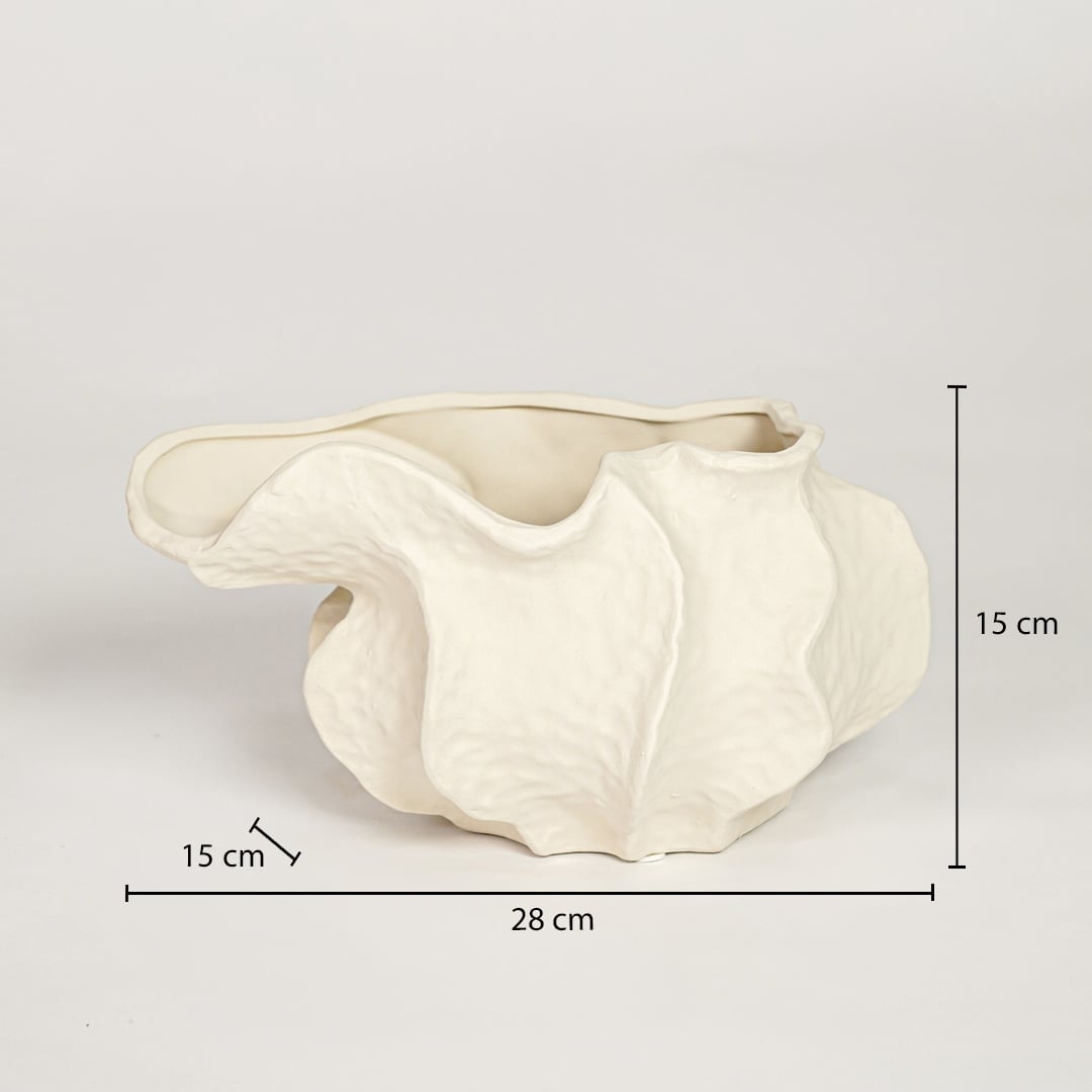 White ceramic abstract decorative bowl measuring 15 cm height 28 cm width and 15 cm depth perfect for tabletop decor placement.