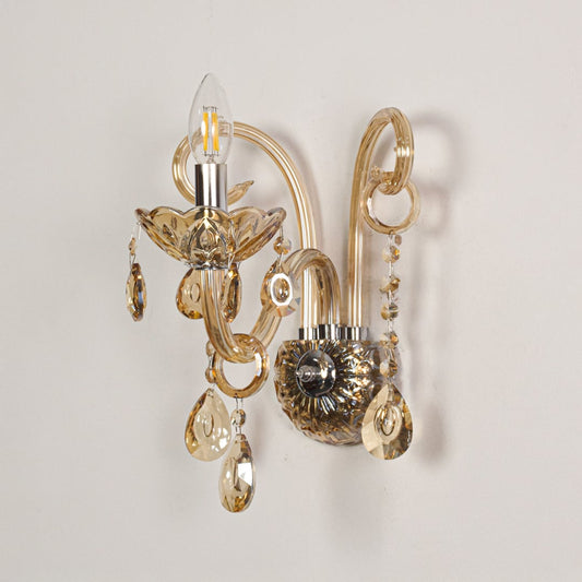 Wall light with champagne glass frame and crystal accents displayed on a white background for clear refined product viewing.