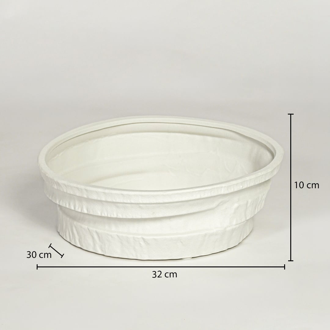 White ceramic round planter measuring 10 cm height 32 cm width and 30 cm depth perfect for indoor decor placement.