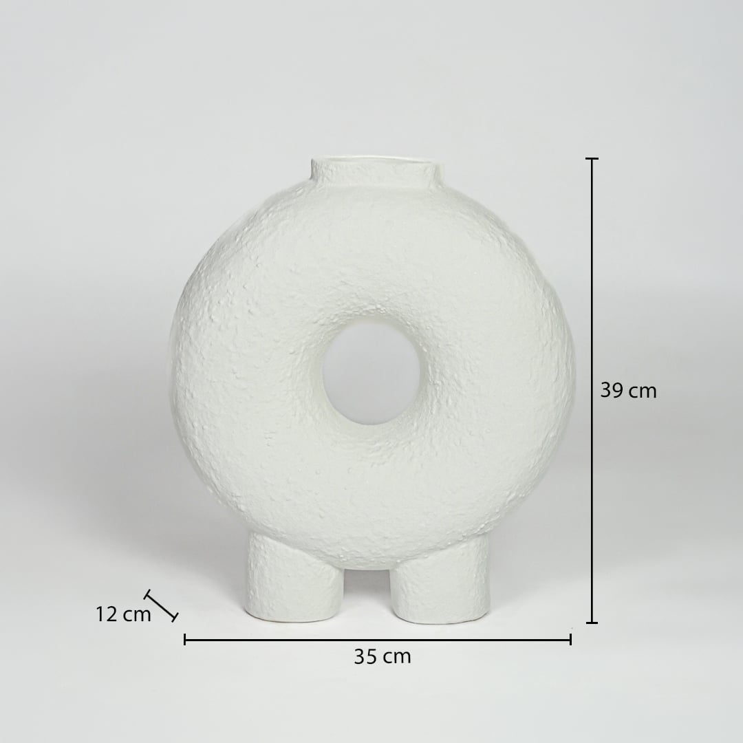 White ceramic donut vase measuring 39 cm height 35 cm width and 12 cm depth ideal for modern console decor styling.