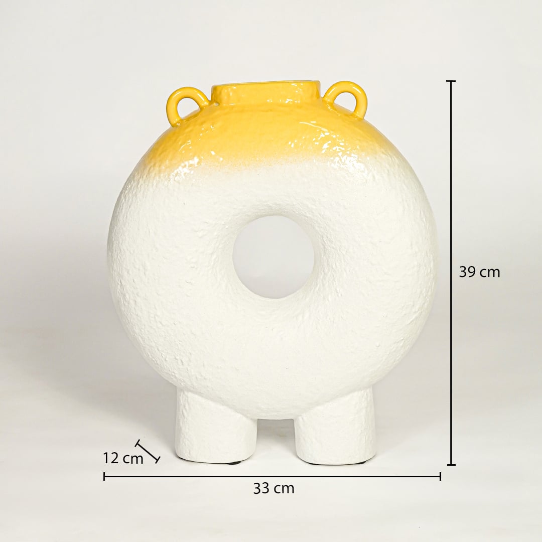 White and yellow ceramic decorative ring vase showing 39 cm height 33 cm width and 12 cm depth suitable for table console or shelf placement.