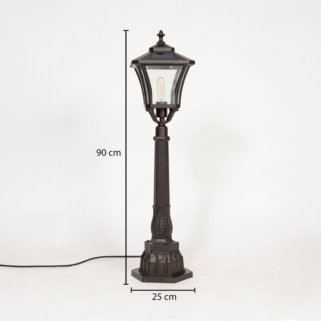 Classic outdoor post lamp in black metal with glass shade showing 90 cm height and 25 cm base width for landscape lighting.
