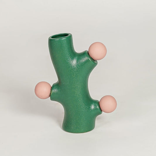 Modern green ceramic flower vase with pink sculpted accents perfect for living room console table shelf or entryway decor styling.