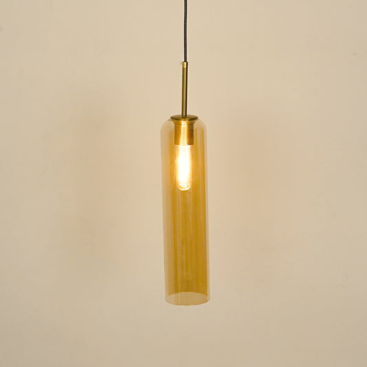 Amber glass pendant light illuminated with warm glow for stylish dining room ceiling decor.