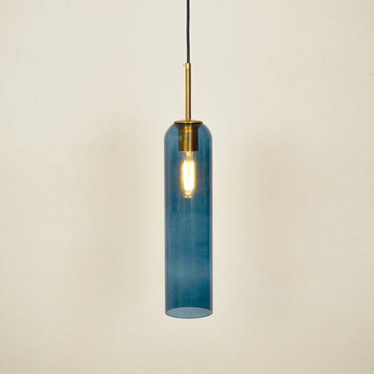 Blue glass pendant light illuminated with warm glow for stylish dining room ceiling decor.