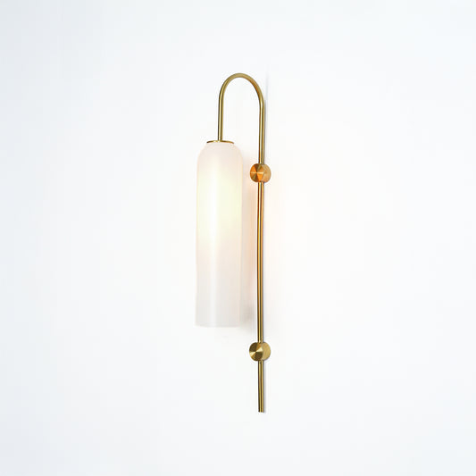 Modern gold metal wall light with white frosted glass shade for stylish bedroom and luxury decor spaces.