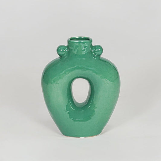 Modern green decorative flower vase isolated clean background stylish ceramic vase for home decor accent.