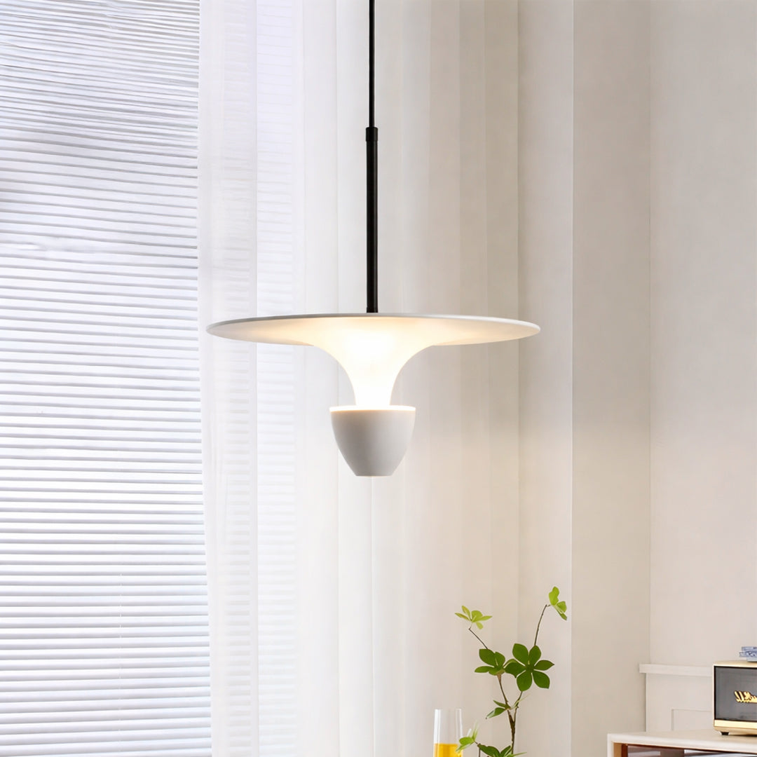 Elegant white pendant light suspended beside window for luxury dining room and modern home decor styling.