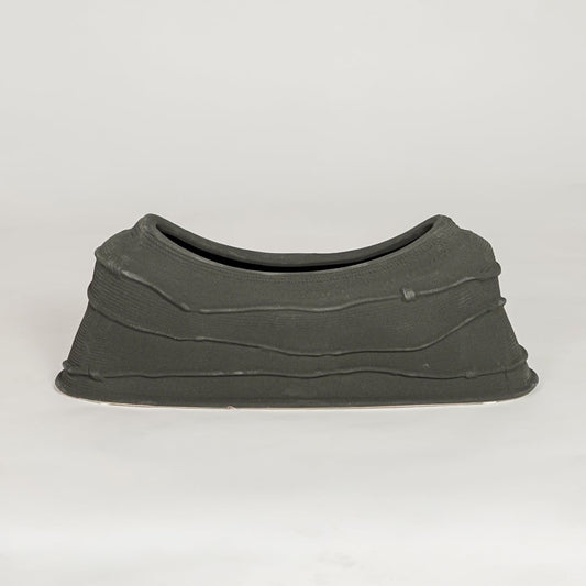 Modern black ceramic decorative serving bowl ideal for fruit display on dining table centerpiece and stylish home decor.