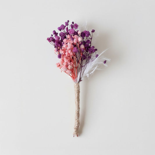 fuscia boutonniere white background