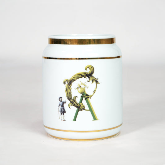 White ceramic jar with gold detailing for luxury console table placement and stylish indoor decor styling accent.