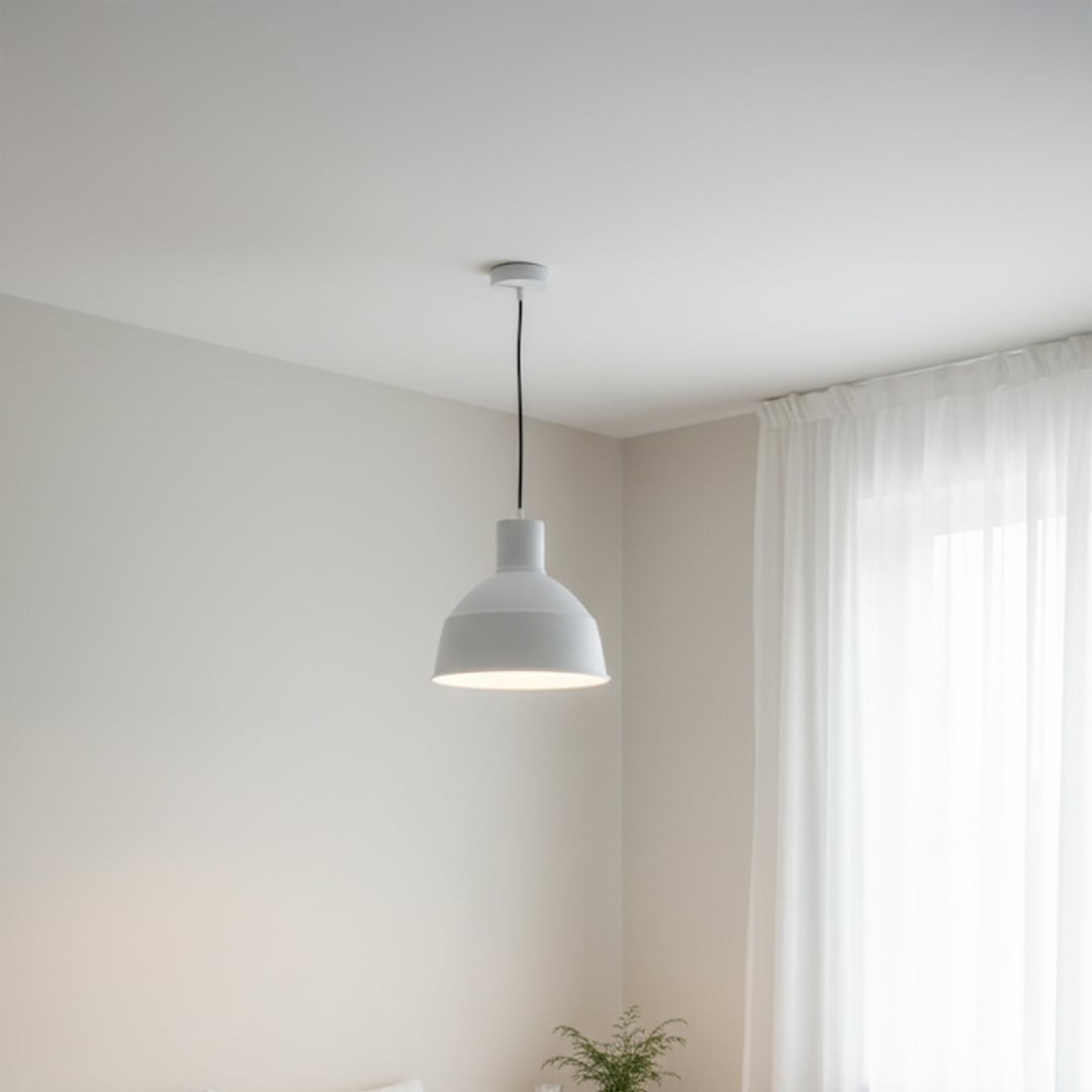 White metal dome pendant light adding minimalist elegance to bright modern bedroom interiors.