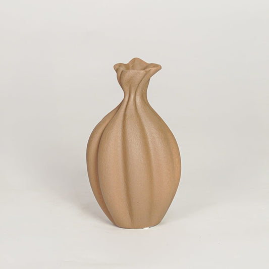Modern beige ceramic decorative vase with organic sculpted design ideal for console table shelf and stylish home decor.