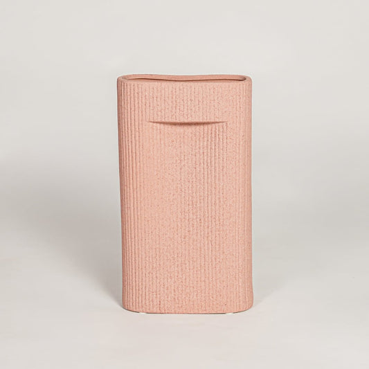 Contemporary peach ceramic flower vase with minimalist sculpted design perfect for entryway table living room decor display.