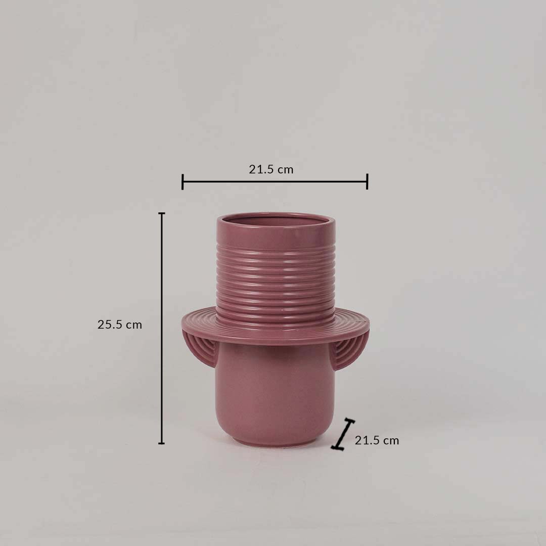 Pink ceramic vase with ribbed texture showing 25.5 cm height and 21.5 cm width ideal for decorative flower styling
