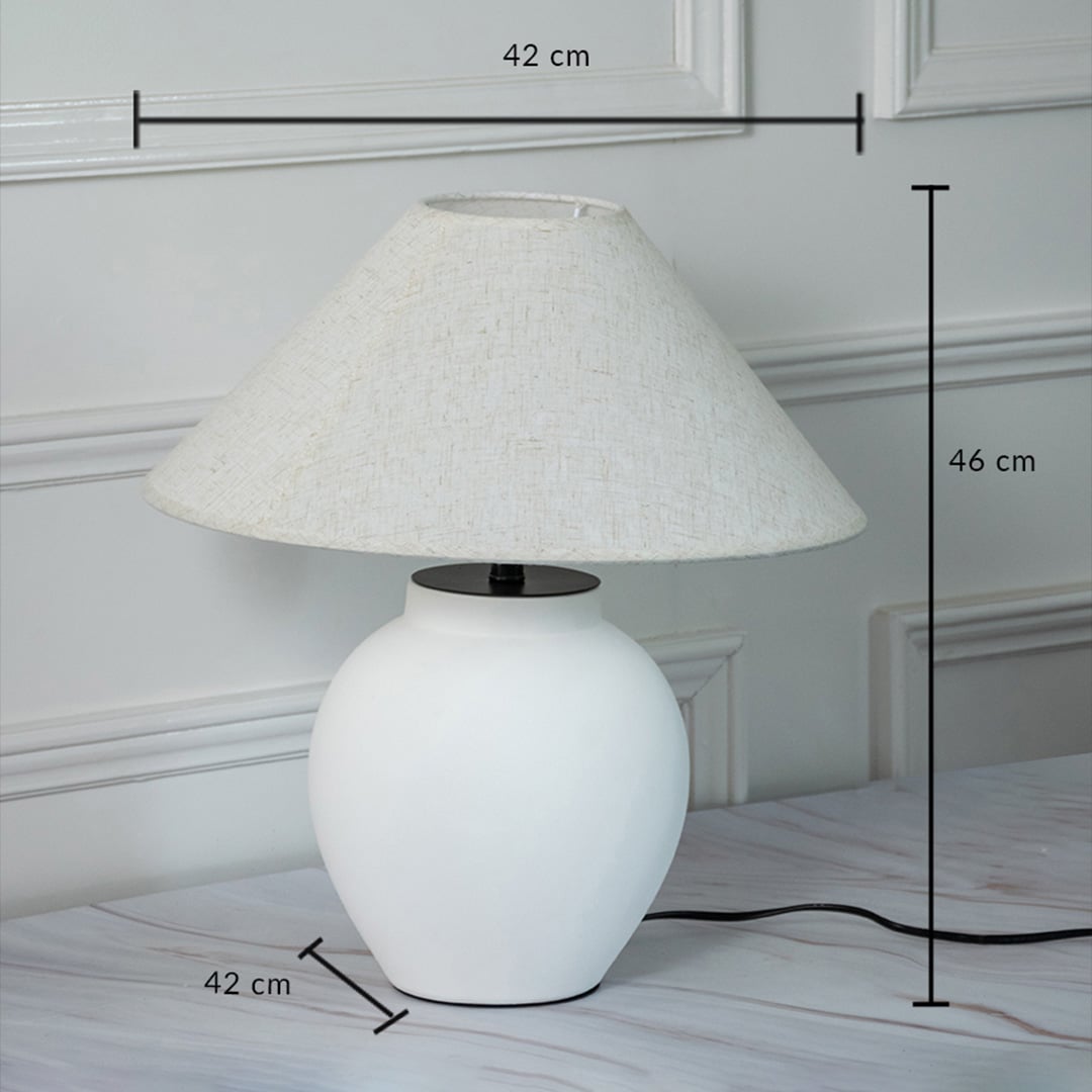 White ceramic table lamp with fabric shade measuring 46 cm height and 42 cm width for elegant table lighting.