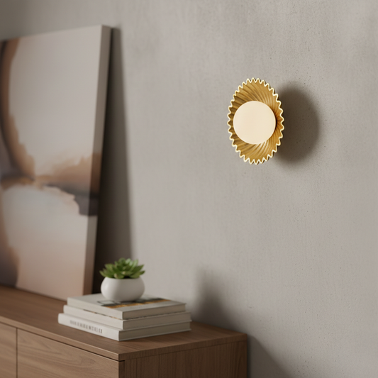 Wall light glowing on textured grey wall above wooden console with gold fluted metal backplate and soft glass globe for luxury Decor.