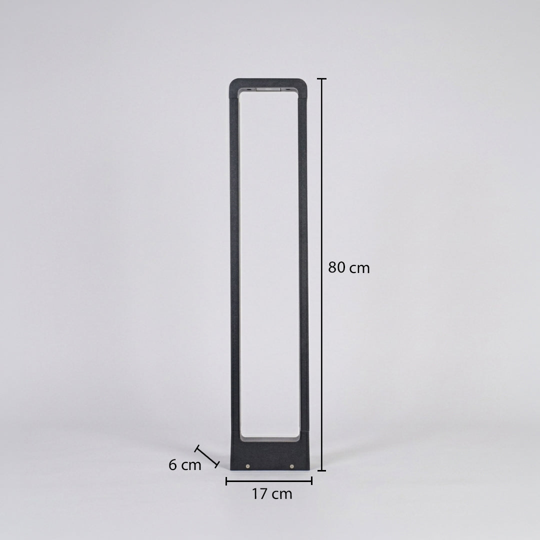 Slim modern outdoor bollard light with rectangular white diffuser and black frame on neutral background 80 cm height 17 cm width 6 cm depth suitable for pathway lighting.