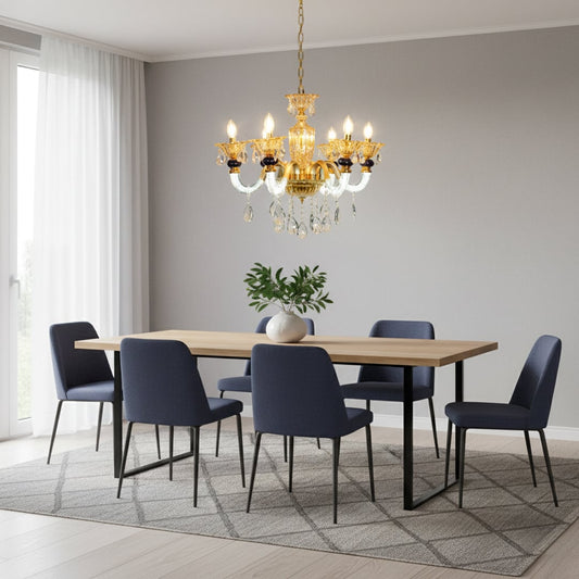 Gold and clear crystal chandelier with navy accents adds elegant warm lighting to living room or dining room ceilings.