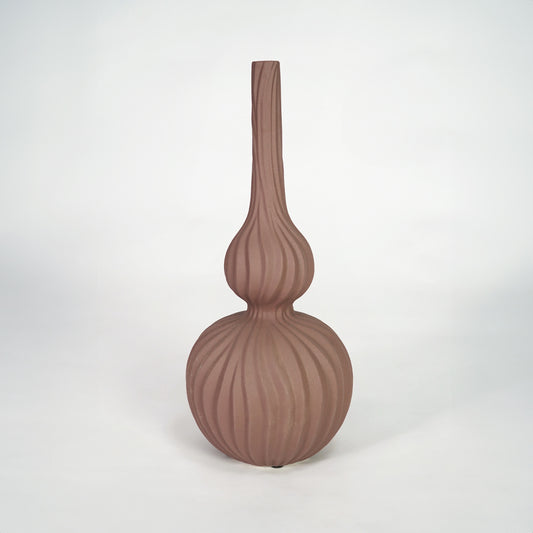 Brown textured ceramic flower vase on white background for elegant modern tabletop decor styling.