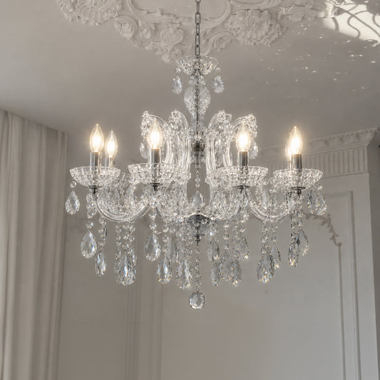 Lifestyle image of silver metal transparent crystal chandelier for luxury ceiling decor styling with modern elegant finish.