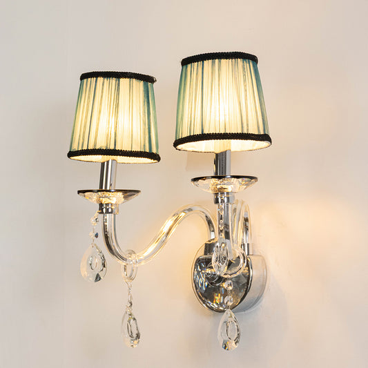 Gold metal wall light with black fabric shades and crystal accents for elegant luxury bedroom wall decor.