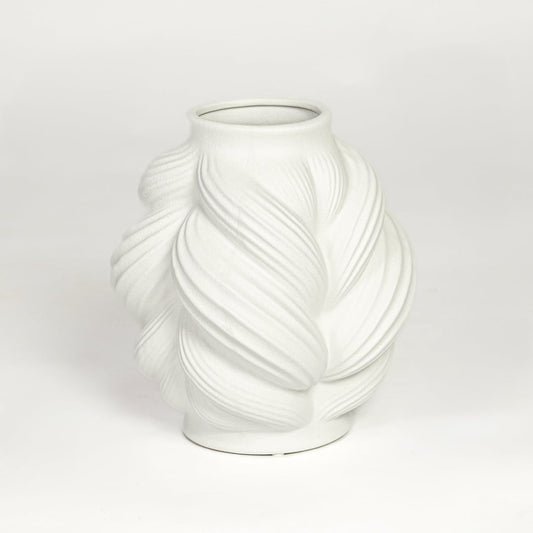 White ceramic sculpted leaf design vase with layered curved pattern isolated on clean white background for modern decor styling.