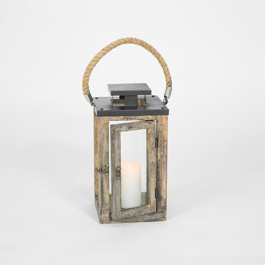 Wooden lantern with a candle inside on a white background