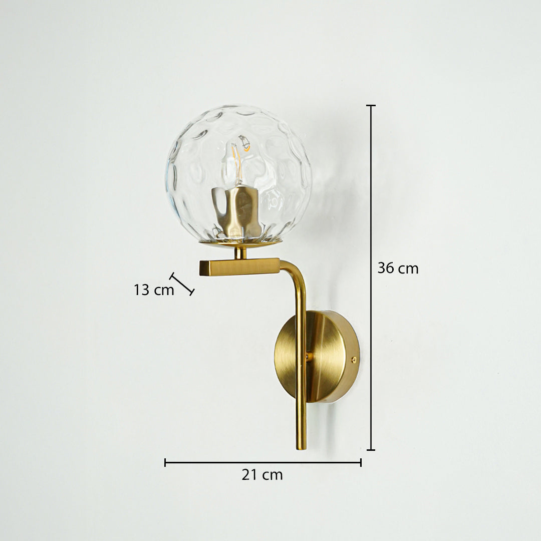 Gold metal textured glass wall light with 36 cm height 21 cm width and 13 cm depth for modern decor spaces.