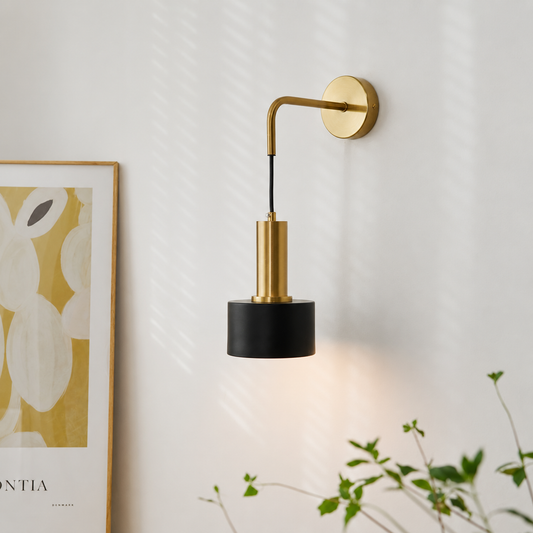 Lifestyle image of modern nordic style golden wall lamp for elegant bedroom decor styling with luxurious metallic finish.