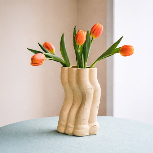 Beige ceramic textured floor vase with sculpted organic design perfect for dried flower display in living room corner and modern home decor.