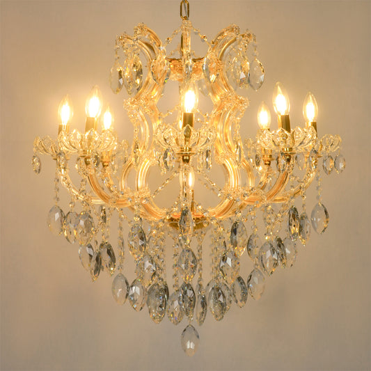 White background image of large clear crystal chandelier for modern living room decor styling with a bright warm lighting.