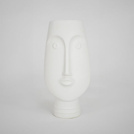 White face ceramic vase for elegant console table placement and contemporary indoor home decor styling piece.