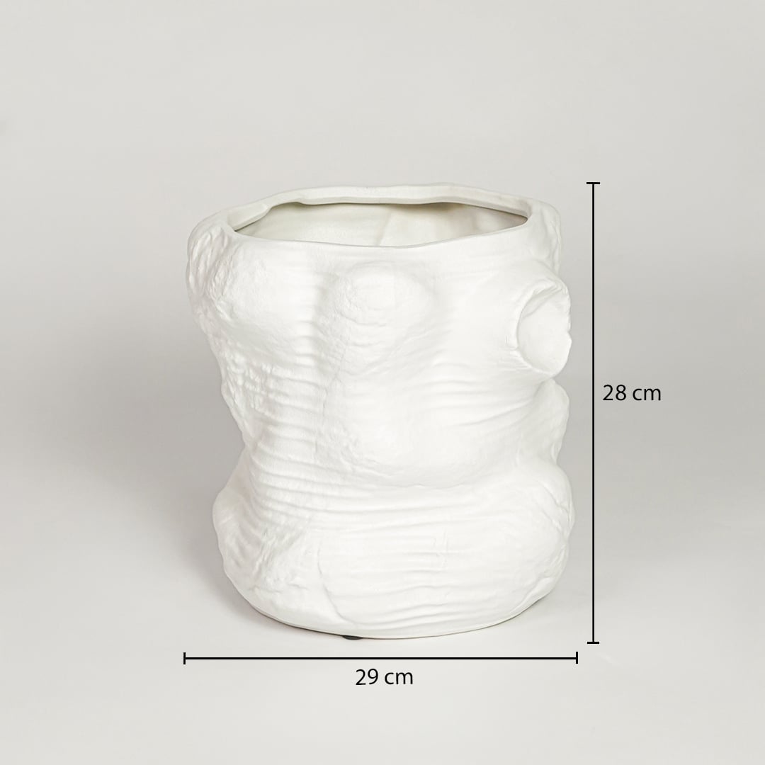 White ceramic sculpted decorative vase measuring 28 cm height and 29 cm width ideal for modern home decor placement.
