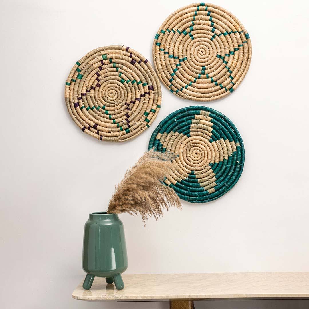 Handcrafted seagrass wall basket set with green leaf pattern for living room bedroom and boho wall décor styling.