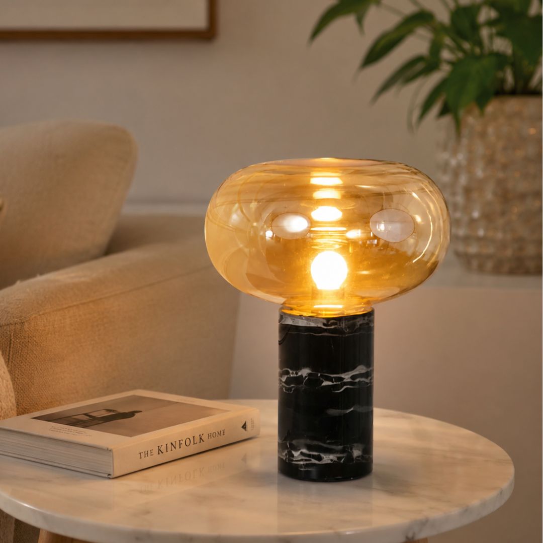 Lifestyle image of nefol golden marble table lamp for elegant modern bedroom decor styling and luxury interior lighting.