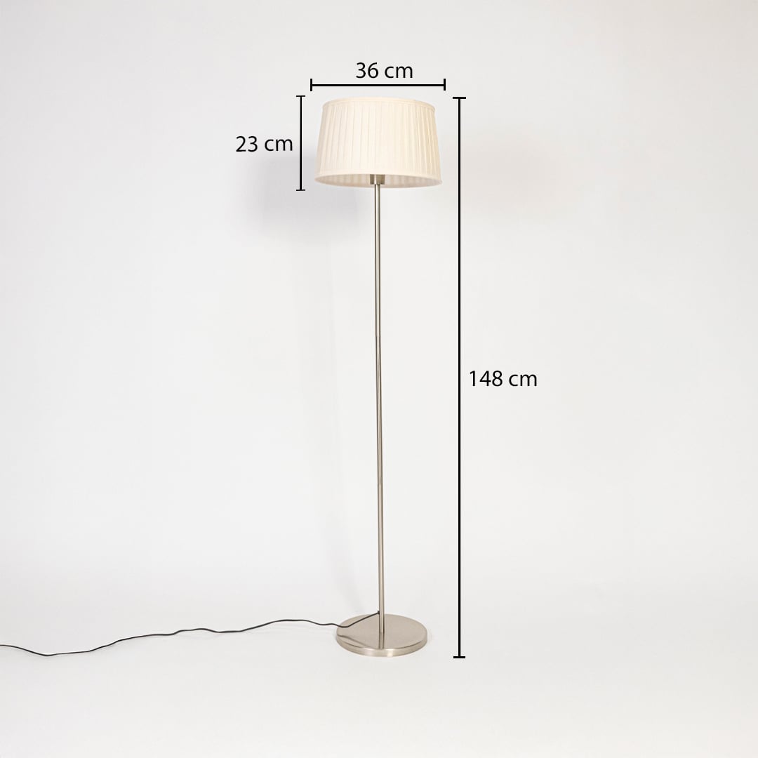 Steel floor lamp with cream pleated fabric shade measuring 148 cm height 36 cm width and 23 cm shade depth.