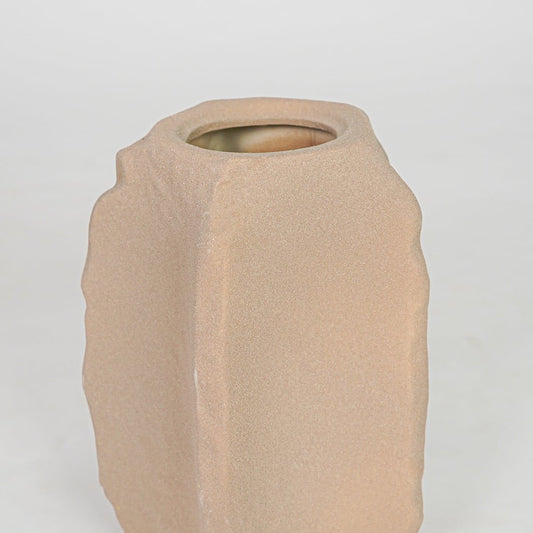 Closeup beige textured ceramic vase surface detail modern decorative flower vase for table shelf decor.