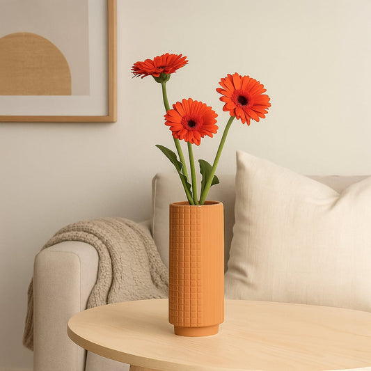 Terracotta ceramic textured vase styled in a modern home setting ideal for shelves tables and warm contemporary interior decor.