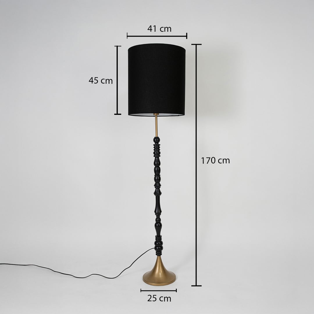 Black fabric shade floor lamp with turned wood stem and brass base measuring 170 cm tall for elegant interior lighting.