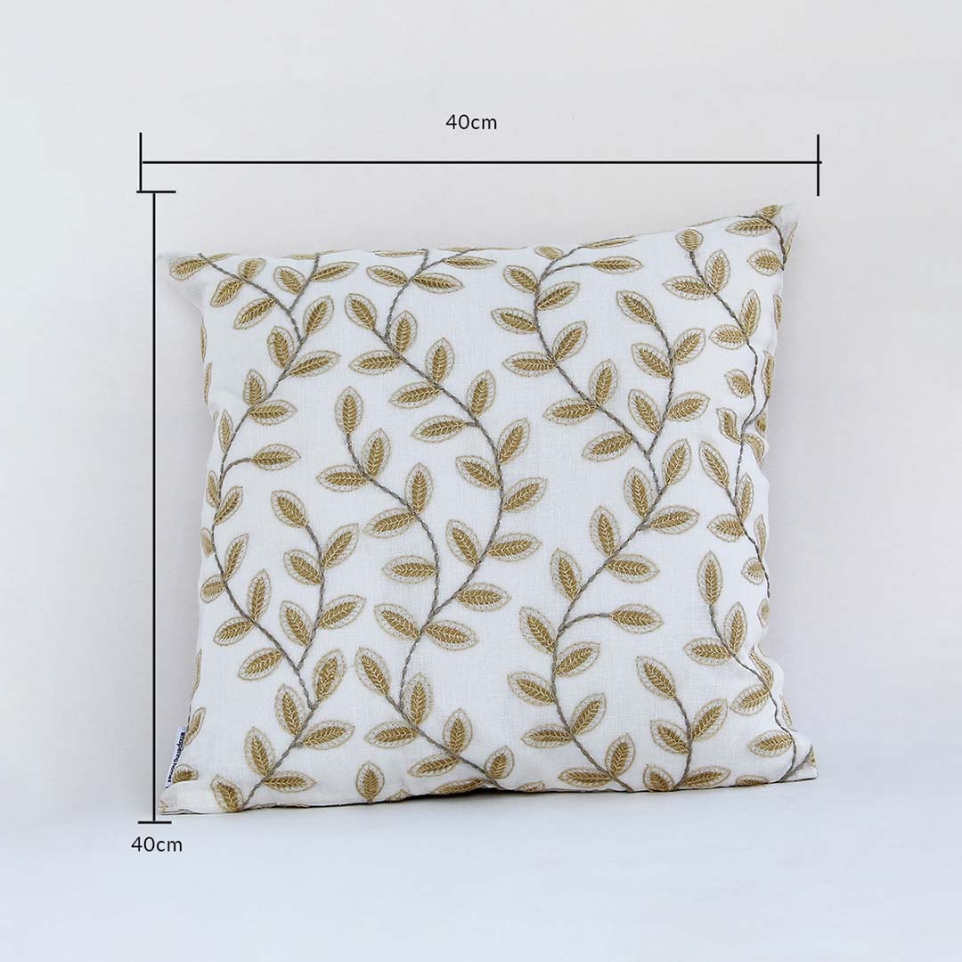 Cushion cover with golden leafy pattern displayed with visible measurement lines showing its exact 40 cm x 40 cm size helping buyers pick the ideal décor size.