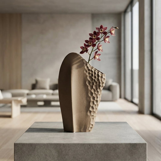 Lifestyle beige ceramic modern art flower vase placed on stone table in luxury living room aesthetic home decor styling idea.