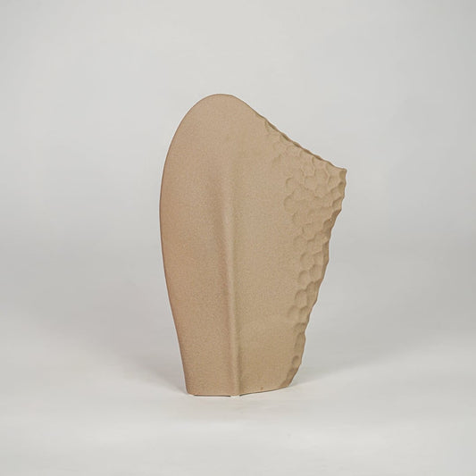 Beige ceramic modern decorative designer vase isolated on clean white background stylish home decor flower vase for shelf table use.