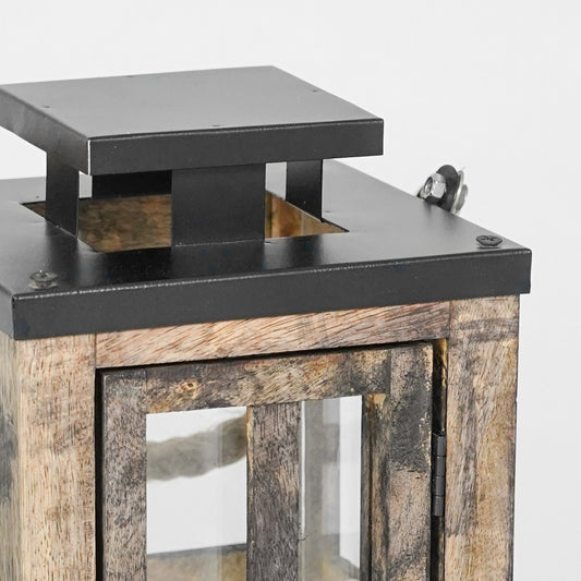 Wooden lantern with metal top on a white background