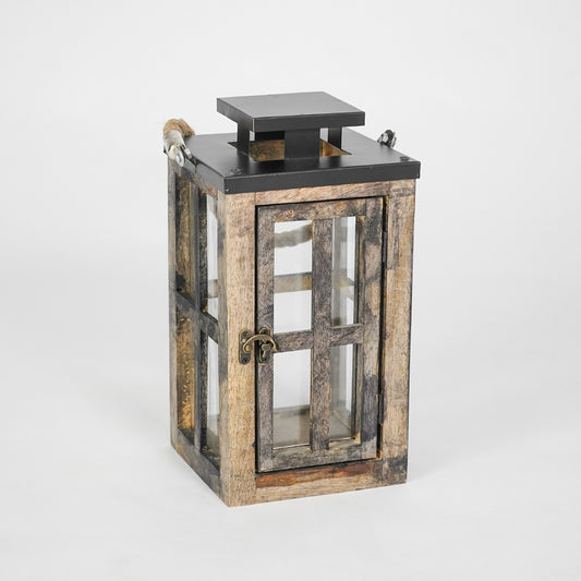 Wooden lantern with glass panels on a white background