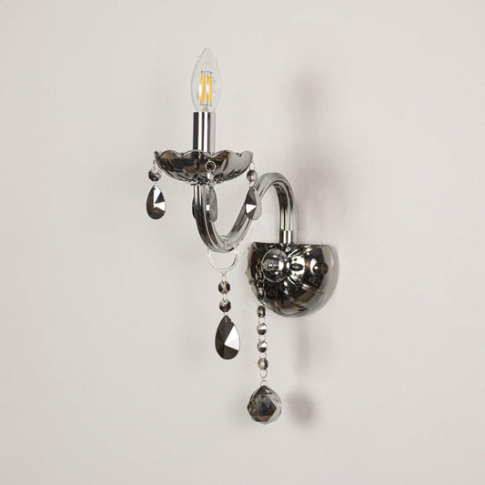 Wall light with chrome metal frame and dark crystal accents displayed on a white background for clear refined product detail.